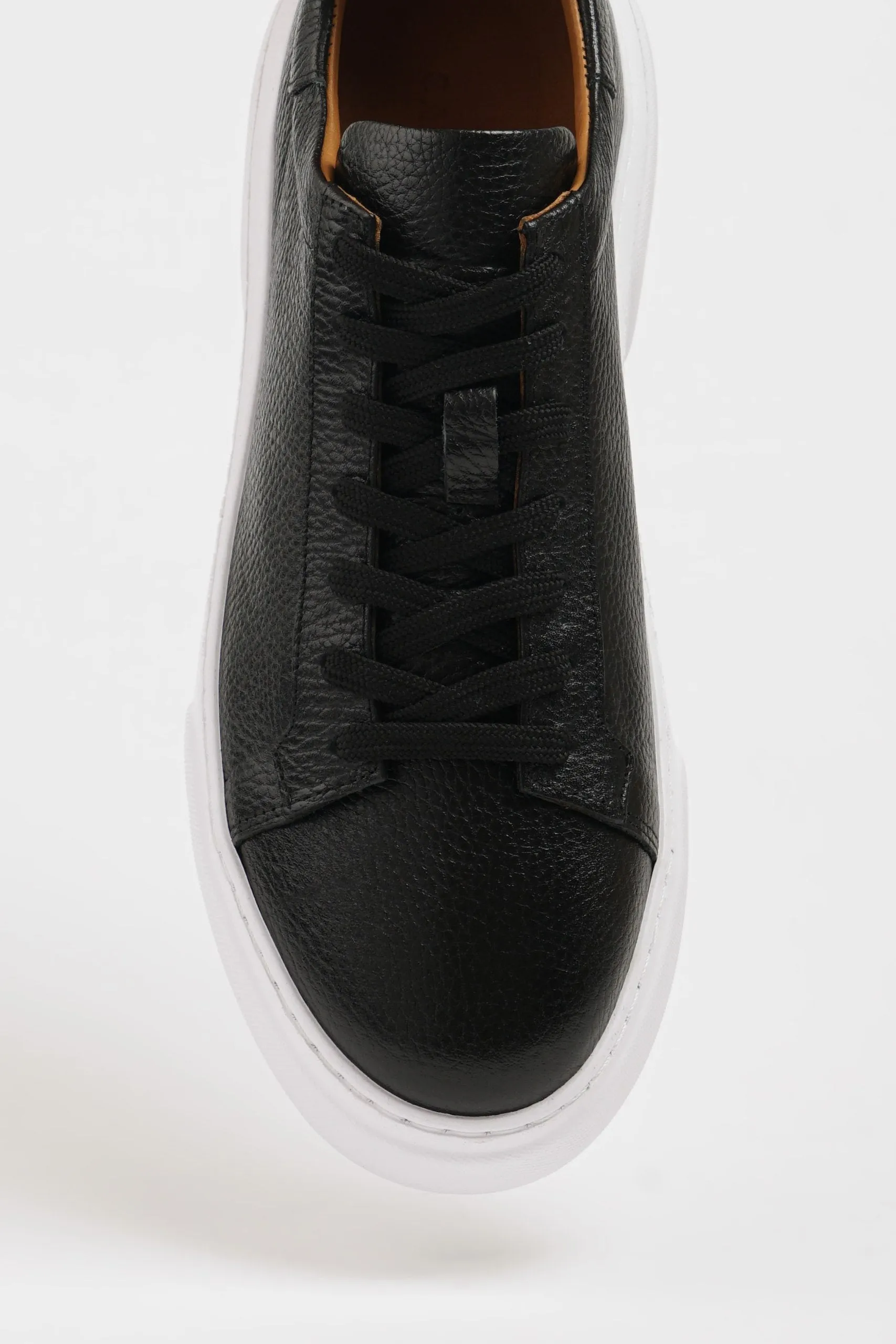 Sleek Traveler Black Leather Sneakers with White Sole